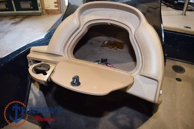 Slide: The Image of Interior view of a 2000 Ranger R83 boat console with storage compartment. - 19