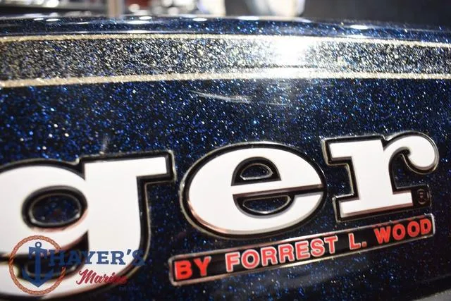 Slide: The Image of Close-up of 2000 Ranger R83 boat logo with glittery blue finish. - 44