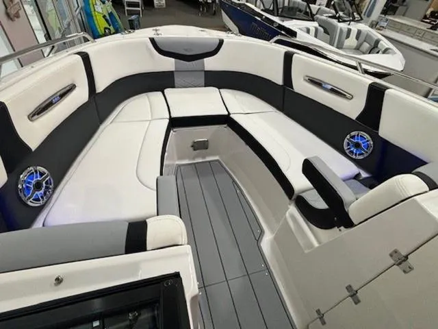 Slide: The Image of 2024 Chaparral 287 SSX boat interior with sleek seating and modern design. - 7
