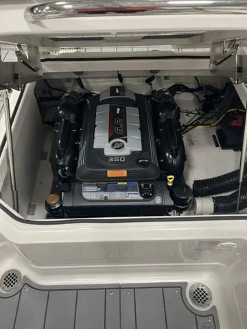 Slide: The Image of 2024 Chaparral 267 SSX boat engine compartment with 6.2L V8 engine. - 8
