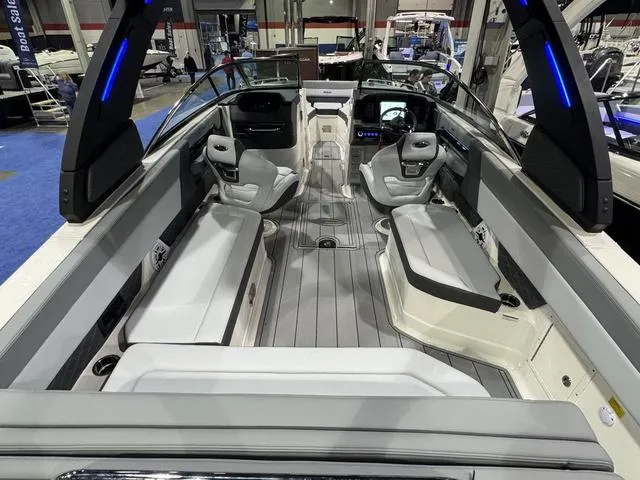 Slide: The Image of 2025 Chaparral 2870 SSX boat interior with sleek seating and modern design. - 3
