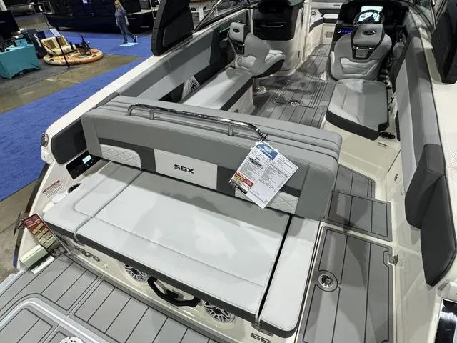 Slide: The Image of 2025 Chaparral 2870 SSX boat interior with gray seating and modern design. - 4