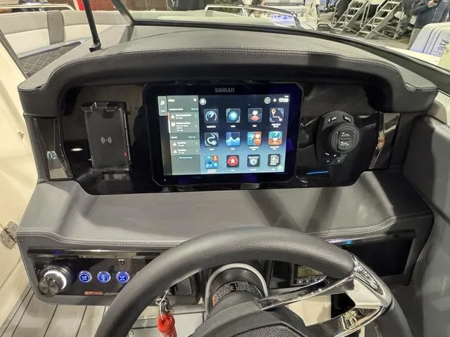 Slide: The Image of 2025 Chaparral 2870 SSX dashboard with touchscreen display and modern controls. - 9