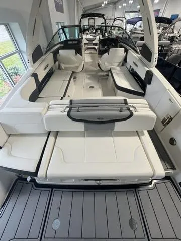 Slide: The Image of 2025 Chaparral 307 SSX boat interior with spacious seating and modern design. - 4