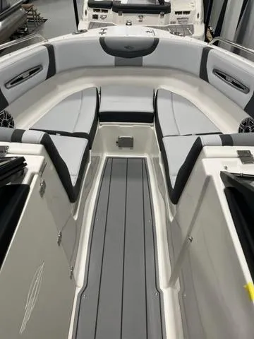 Slide: The Image of 2025 Chaparral 247 SSX boat interior with sleek seating and modern design. - 8