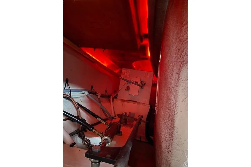 Slide: The Image of Engine compartment of 1996 Cruisers Yachts 3650 Motoryacht with red lighting. - 20
