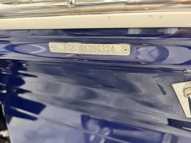 Slide: The Image of 2024 Chaparral 21 SSi boat with visible hull identification number. - 13