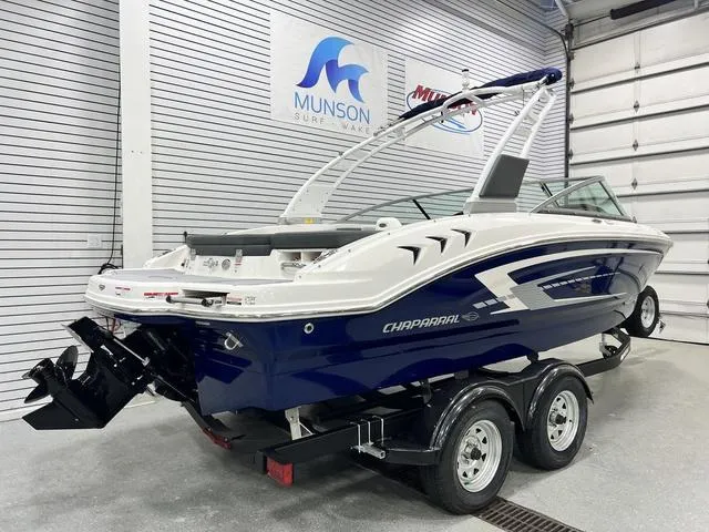 Slide: The Image of 2024 Chaparral 21 SSi boat on trailer in showroom. - 4