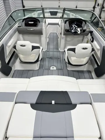 Slide: The Image of 2024 Chaparral 21 SSi boat interior with modern seating and sleek design. - 5