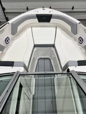Slide: The Image of 2024 Chaparral 21 SSi boat interior with sleek seating and modern design. - 6