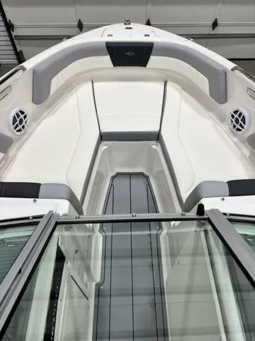 Slide: The Image of 2024 Chaparral 21 SSi boat interior with sleek seating and modern design. - 7