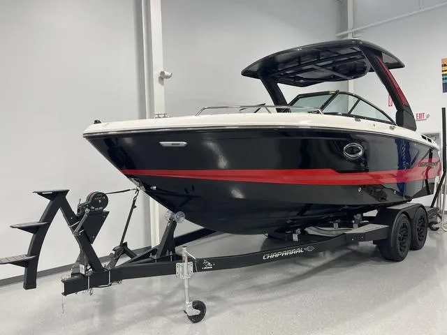 Slide: The Image of Chaparral 26 Surf 2025 boat, 2024 customer satisfaction award, Munson Ski & Marine, 99% rating. - 2