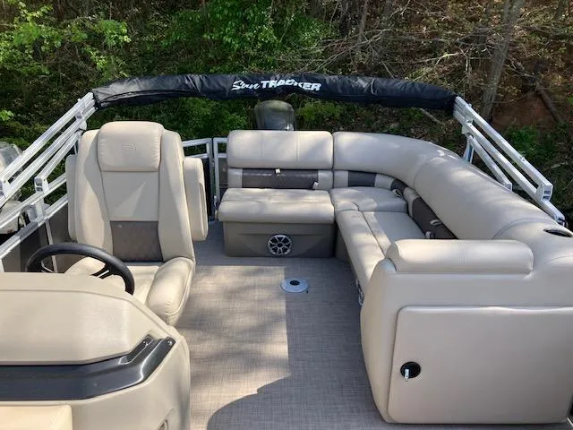 Slide: The Image of 2025 Sun Tracker Party Barge 20 DLX with spacious seating and modern design. - 2