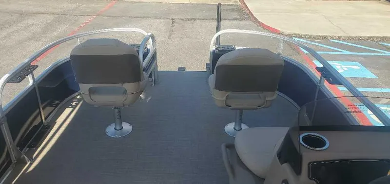 Slide: The Image of 2025 Sun Tracker Bass Buggy 16 XL Select interior with two swivel seats and spacious deck. - 6