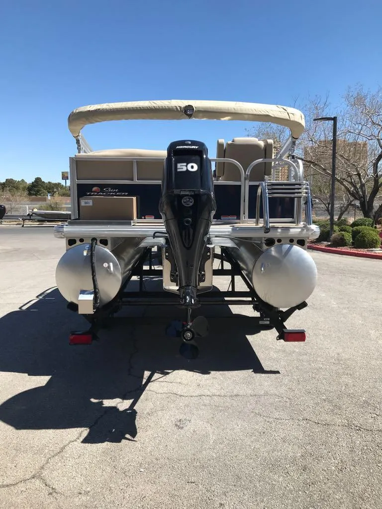 Slide: The Image of 2025 Sun Tracker Bass Buggy 16 XL Select pontoon boat with 50 HP motor. - 4