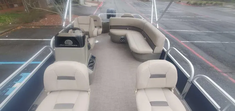 Slide: The Image of 2025 Sun Tracker Bass Buggy 18 DLX pontoon boat interior with spacious seating. - 5