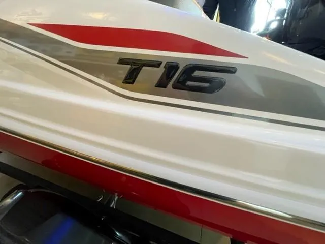 Slide: The Image of 2025 Tahoe T16 boat with sleek design and bold red accents. - 4