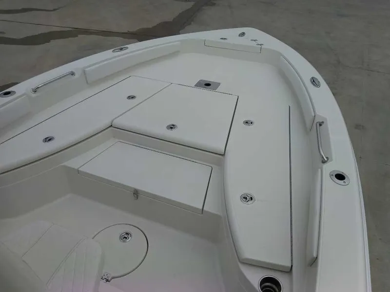 Slide: The Image of 2025 Ranger 2660 Bay boat deck with seating and storage compartments. - 8