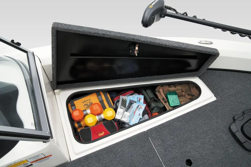 Slide: The Image of 2024 Triton 186 Allure boat interior with steering wheel and seating. - 15