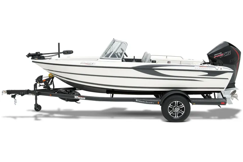 Slide: The Image of 2024 Triton 186 Allure boat displayed in a showroom, showcasing sleek design and modern features. - 9