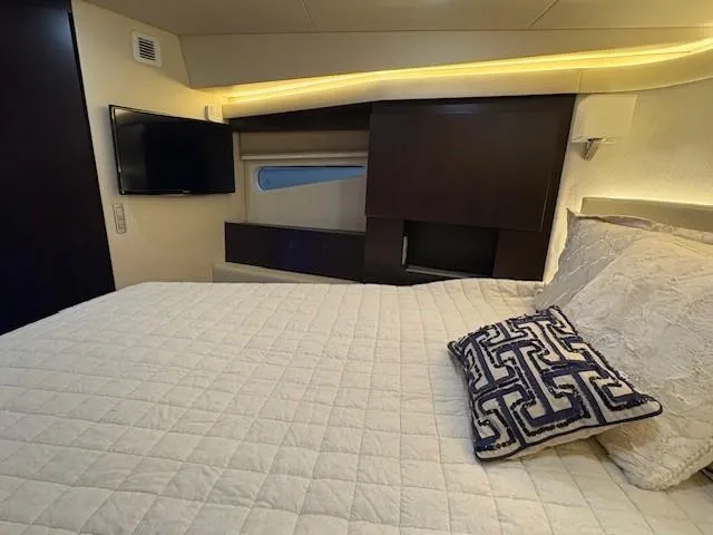 Slide: The Image of Luxurious bedroom interior of 2018 Regal 42 Grande Coupe yacht with modern decor. - 15