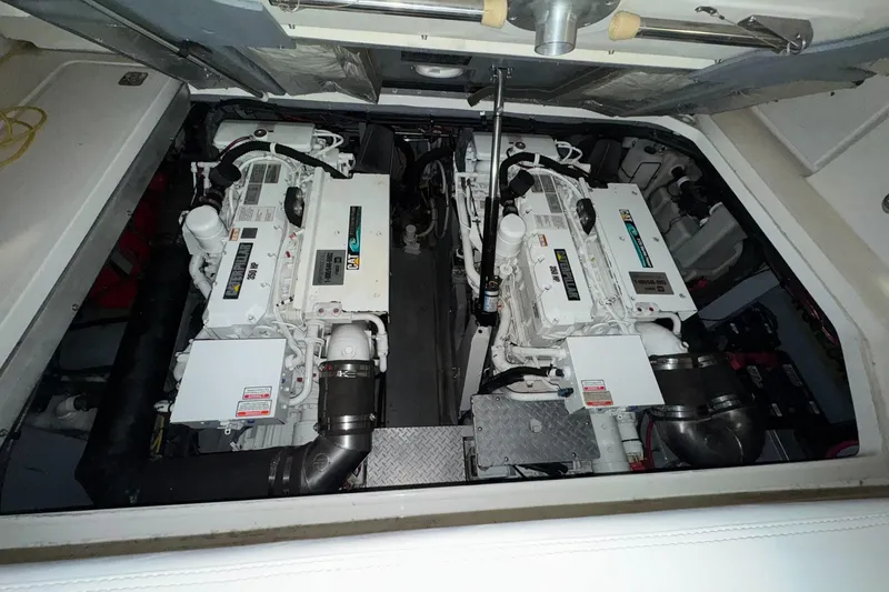 Slide: The Image of Engine room of 2002 Sea Ray 410 Sundancer with dual engines. - 7