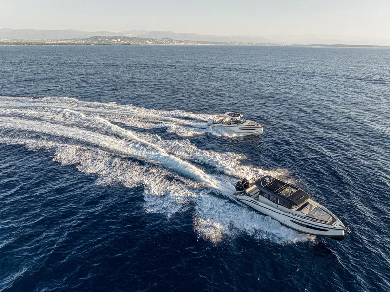 Slide: The Image of Two Navan S30 boats cruising on open water, 2025 model. - 20