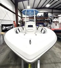 Slide: The Image of 2025 Tidewater 198 CC Adventure boat in showroom, front view. - 5