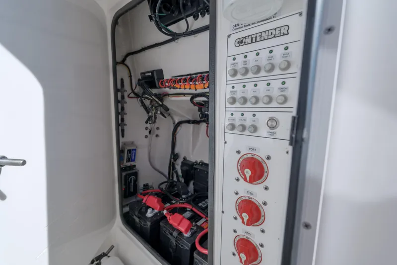 Slide: The Image of Electrical panel and battery setup in 2022 Contender 25 boat. - 13