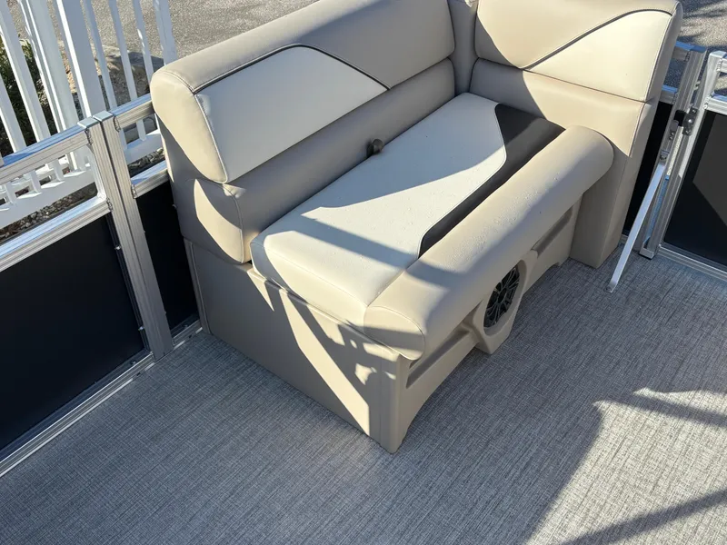 Slide: The Image of 2025 Tahoe Pontoon 15 Sport steering console with modern controls and seating. - 4