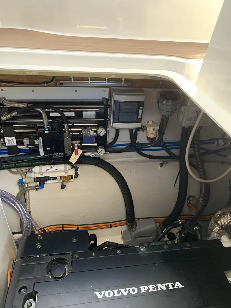 Slide: The Image of Engine compartment of 2024 Fountaine Pajot MY5 with Volvo Penta components. - 10