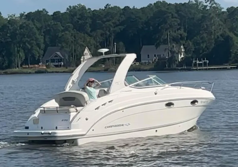 The Image of 2011 Chaparral 270 Signature boat on a calm lake. - 0