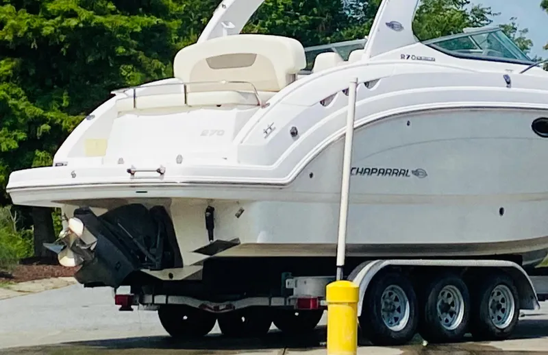 Slide: The Image of 2011 Chaparral 270 Signature boat on trailer, side view. - 18