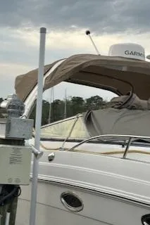 Slide: The Image of Chaparral 270 Signature 2011 docked under cloudy sky. - 30