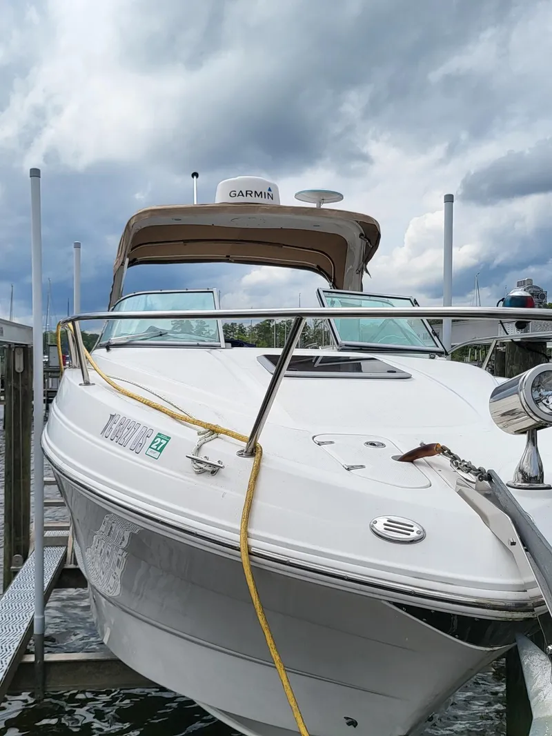 Slide: The Image of Chaparral 270 Signature 2011 at dock, cloudy sky. - 34