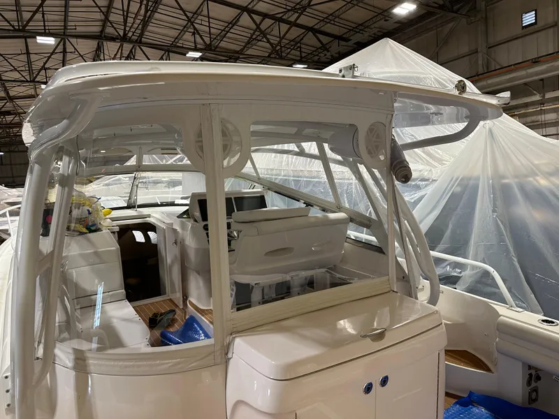 Slide: The Image of 2017 Intrepid 430 Sport Yacht in storage, showcasing sleek design and spacious interior. - 23