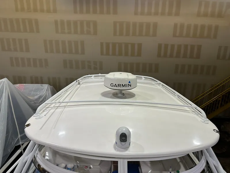 Slide: The Image of 2017 Intrepid 430 Sport Yacht with Garmin radar, indoor storage setting. - 26