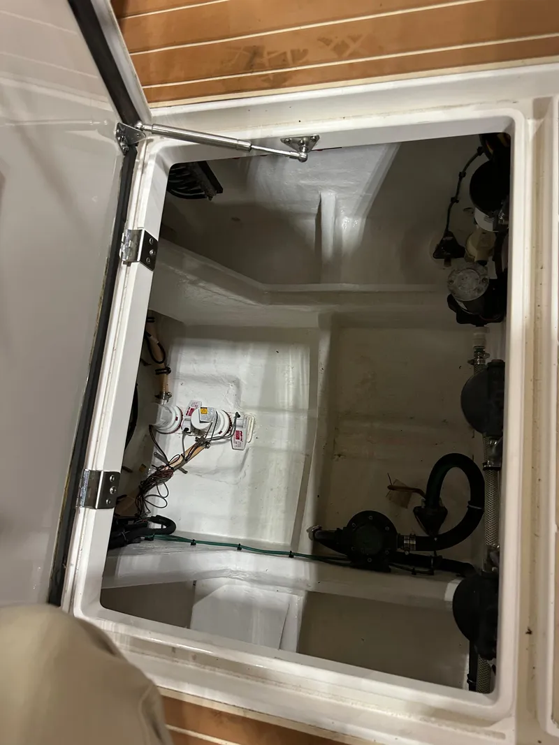 Slide: The Image of Engine compartment of a 2017 Intrepid 430 Sport Yacht, showing wiring and components. - 30