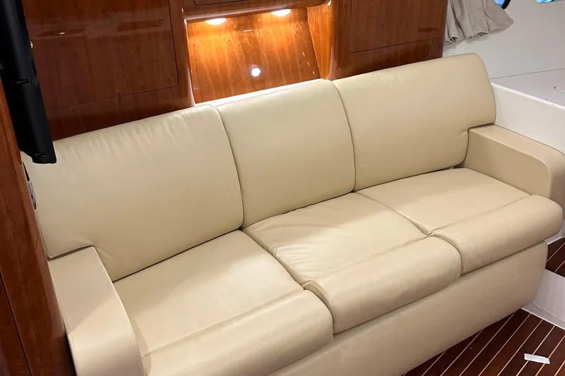 Slide: The Image of Beige leather sofa in 2017 Intrepid 430 Sport Yacht interior. - 41