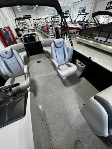 Slide: The Image of 2025 Bentley Pontoons 200 Navigator interior with modern seating and sleek design. - 10