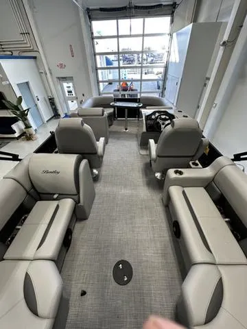 Slide: The Image of 2025 Bentley Pontoons 200 Navigator interior with luxurious seating and modern design. - 7