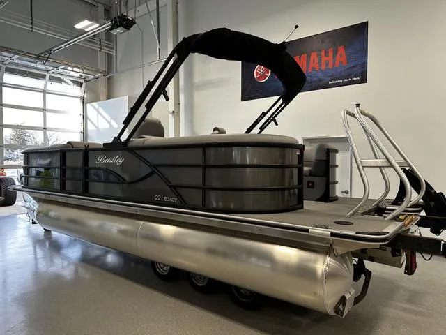 Slide: The Image of 2025 Bentley Pontoons 223 NAVIGATOR pontoon boat in showroom, side view. - 3