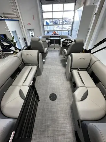 Slide: The Image of 2025 Bentley Pontoons 223 NAVIGATOR interior with luxurious seating and modern design. - 4