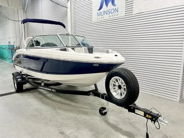 Slide: The Image of 2024 Chaparral 19 SSi OB boat on trailer in showroom. - 3