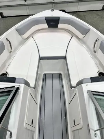 Slide: The Image of 2024 Chaparral 19 SSi OB boat interior with sleek seating and modern design. - 7