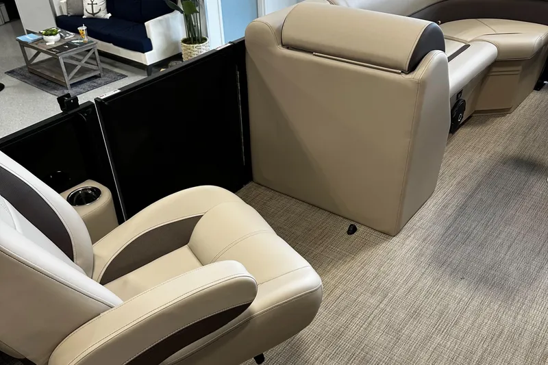 Slide: The Image of 2025 Bentley Pontoons 223 NAVIGATOR interior with beige seating and modern design. - 11