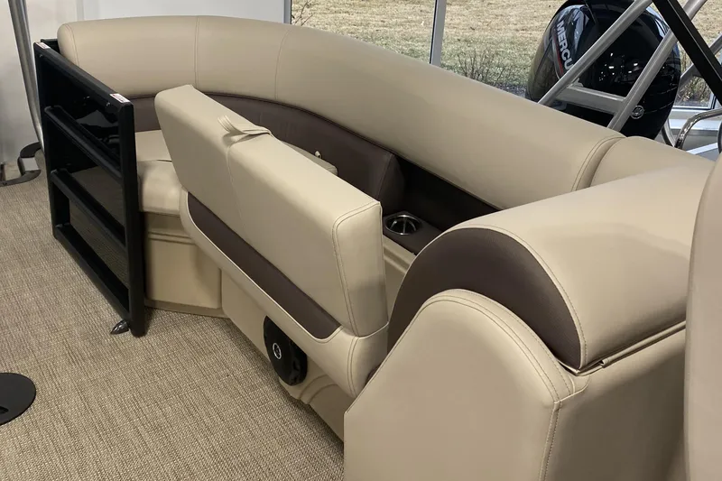 Slide: The Image of 2025 Bentley Pontoons 223 NAVIGATOR interior with beige seating and cup holders. - 15