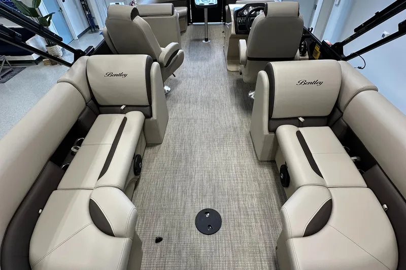 Slide: The Image of 2025 Bentley Pontoons 223 NAVIGATOR interior with luxurious beige seating and modern design. - 7