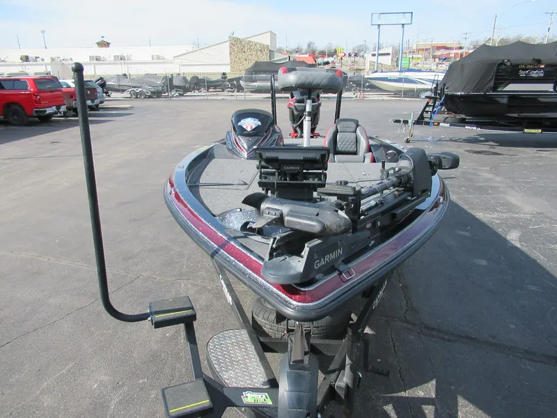 Slide: The Image of 2024 Caymas CX 20 boat with Garmin equipment, parked outdoors. - 5