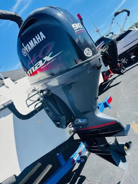 Slide: The Image of 2024 Starcraft SVX 171 with Yamaha VMAX 90 outboard motor, parked on a trailer. - 7
